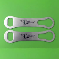 Two stainless steel dog bone bottle openers with silkscreen logo on green background.