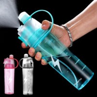 20 fl.oz. misting water bottle in blue, pink, and gray with ergonomic handle and built-in spray for workouts and outdoor use.